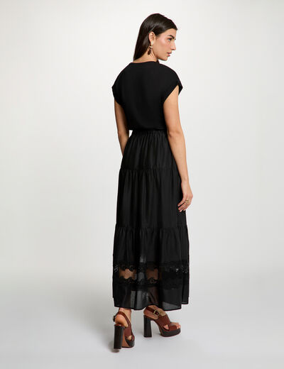 Camiseta bordado rostro negro mujer