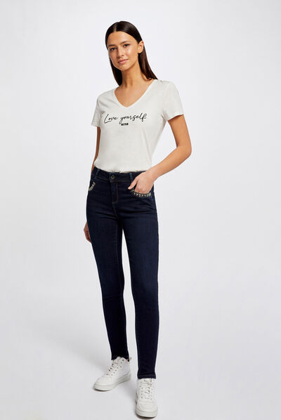 Vaquero slim bolsillos con tachuelas vaquero en bruto mujer