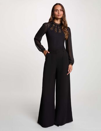 Pantal&oacute;n ancho de tiro alto negro mujer