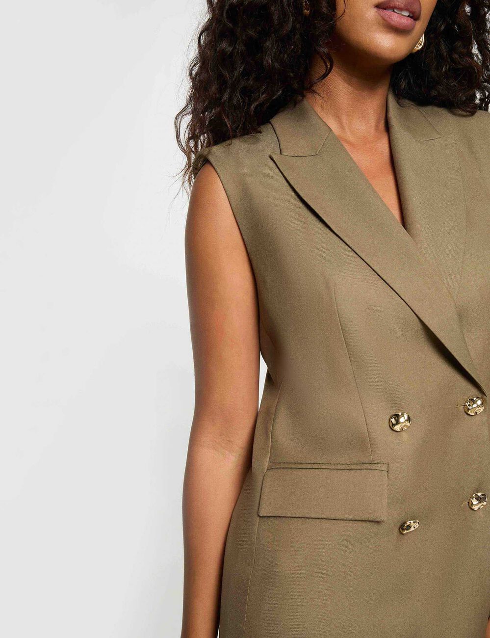 Chaqueta sin mangas verde caqui mujer
