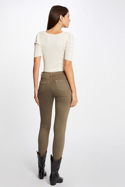 Pantalón slim con detalles tipo joya  mujer