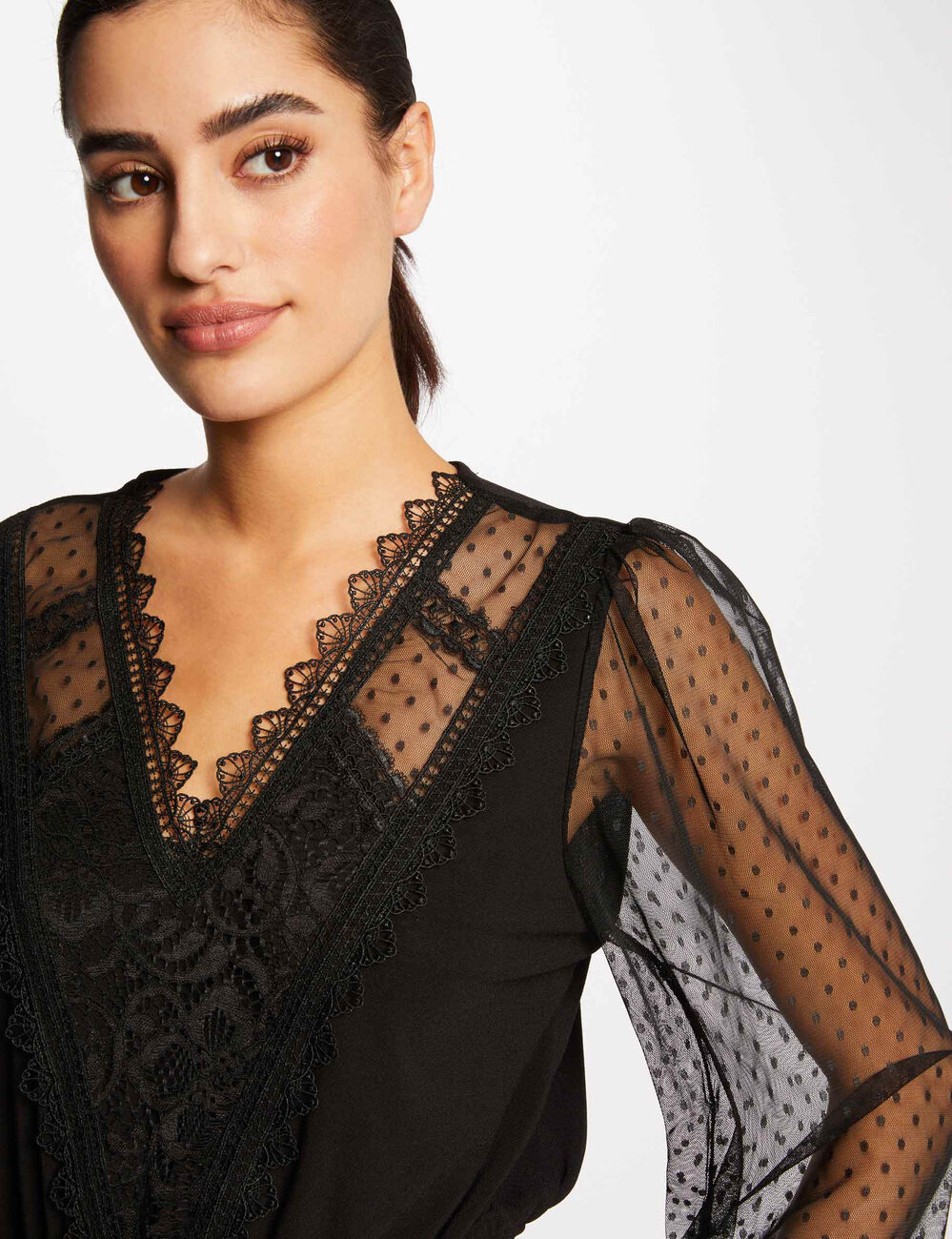 Camiseta manga larga con plumeti negro mujer