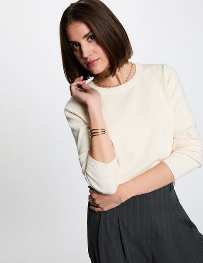 Jersey de punto con relieve marfil mujer
