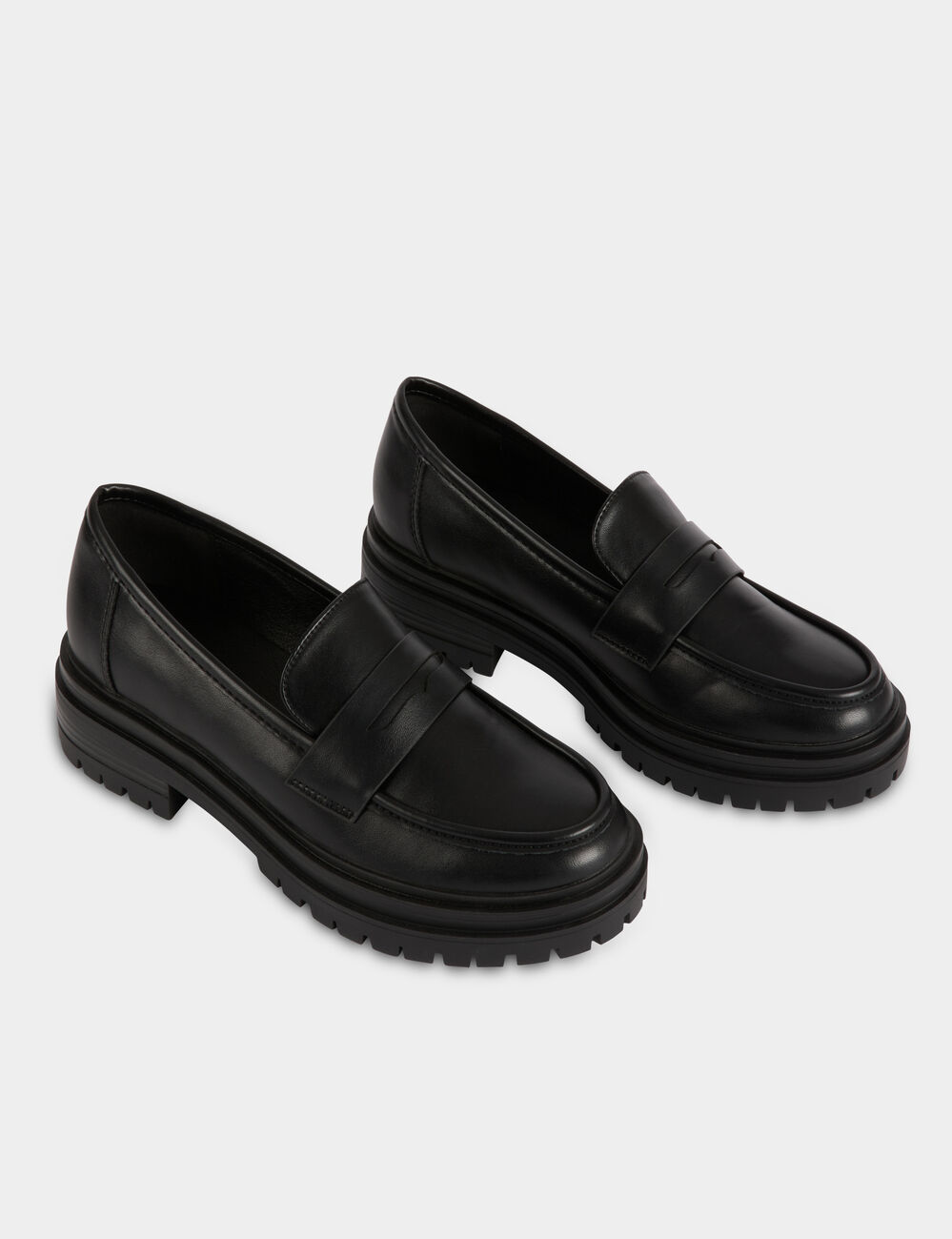 Mocasines con suela dentada negro mujer