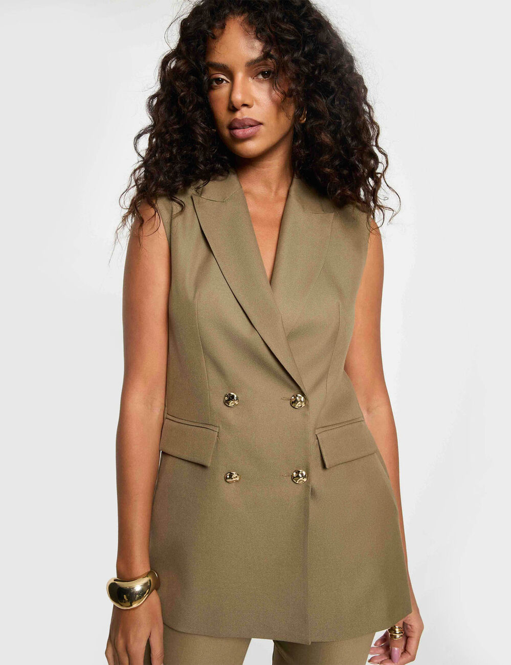 Chaqueta sin mangas verde caqui mujer