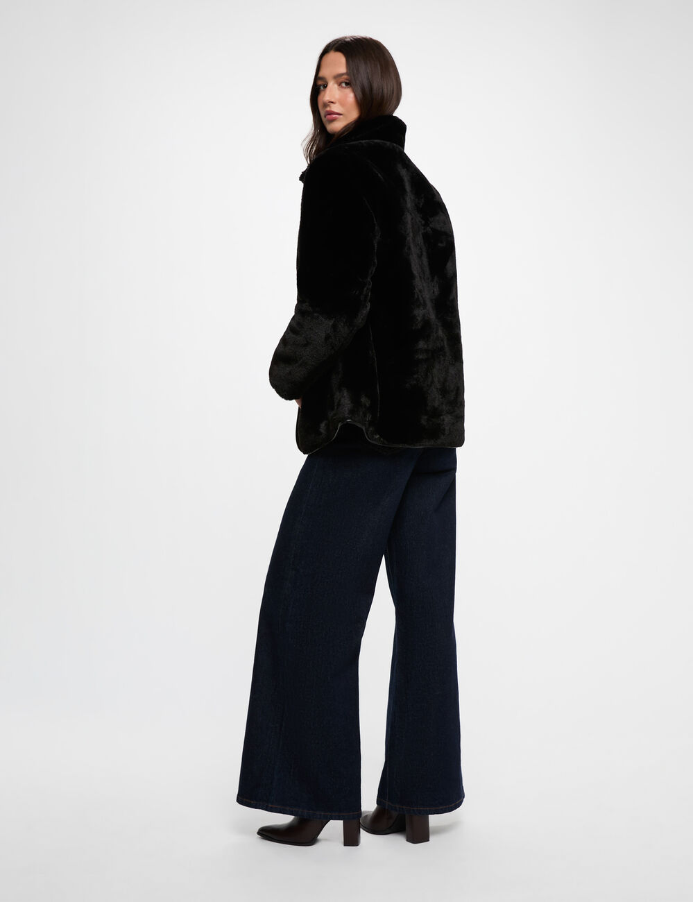 Plum&iacute;fero reversible negro mujer