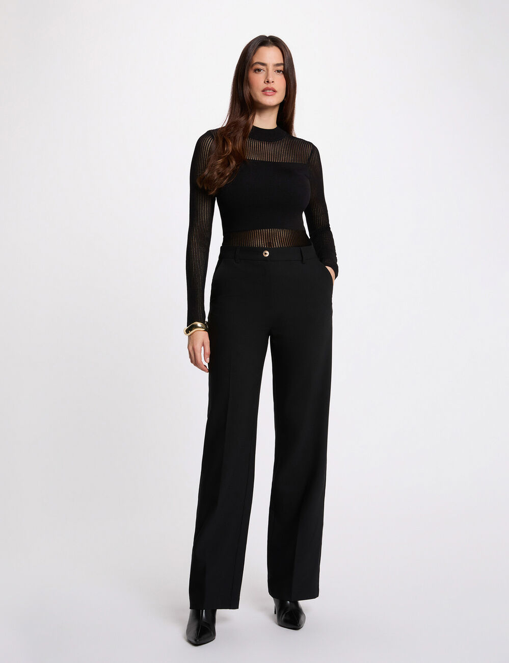 Jersey calado de cuello alto negro mujer