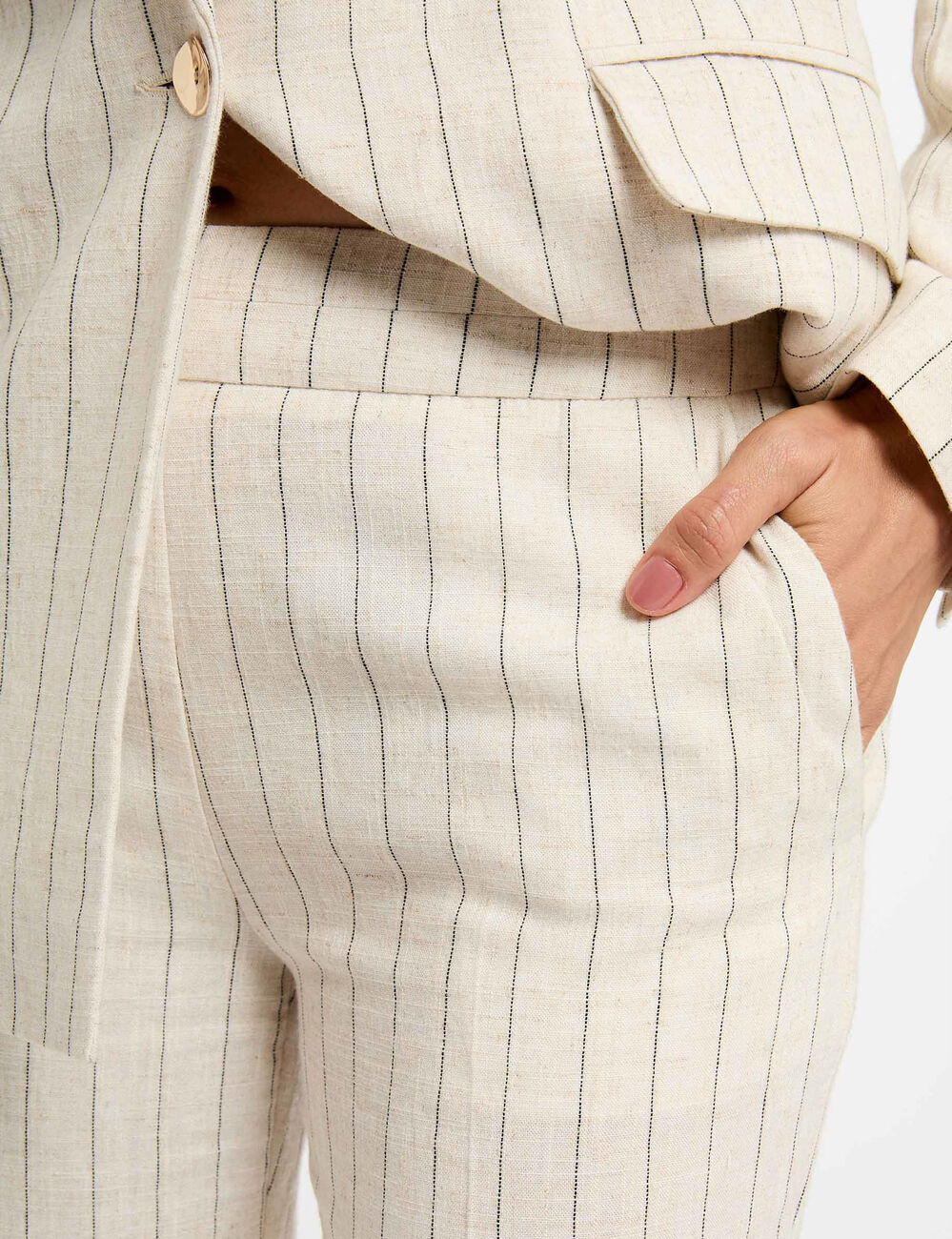 Pantal&oacute;n pernera ancha rayas beige mujer