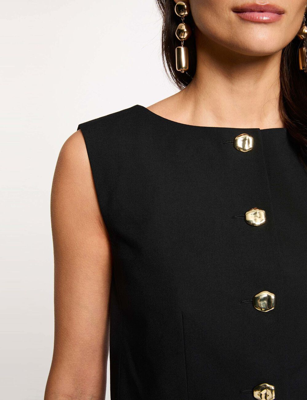 Chaqueta ajustada sin mangas negro mujer