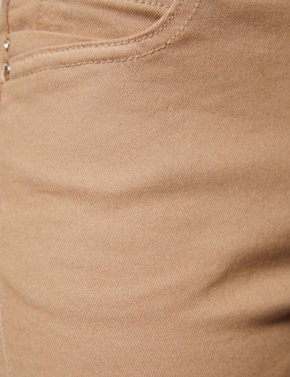 Vaquero skinny talle bajo arena mujer