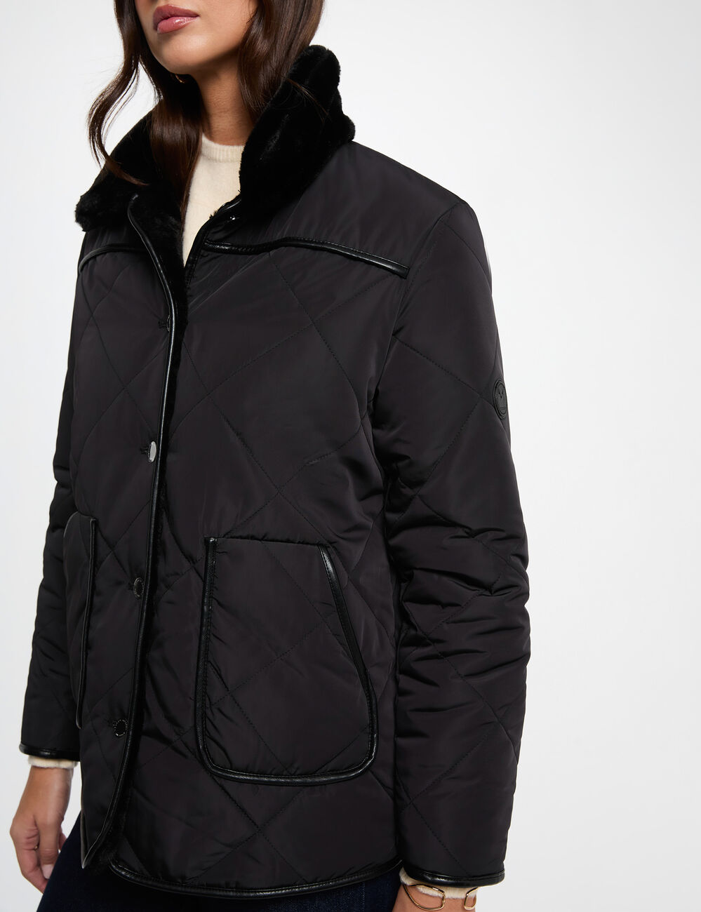 Plum&iacute;fero reversible negro mujer