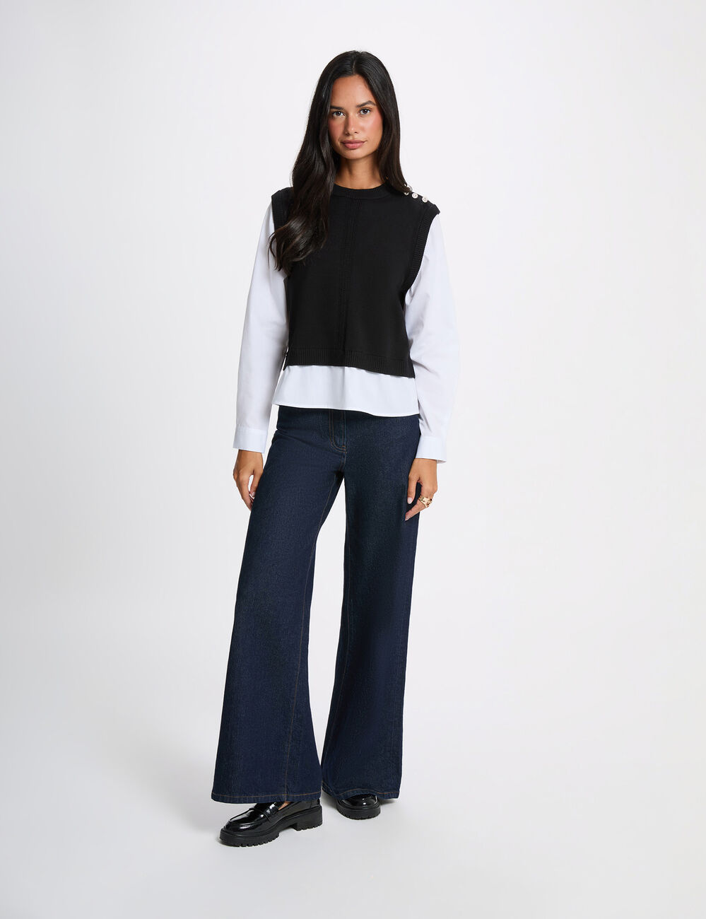 Jersey ajustado con cuello vuelto negro mujer