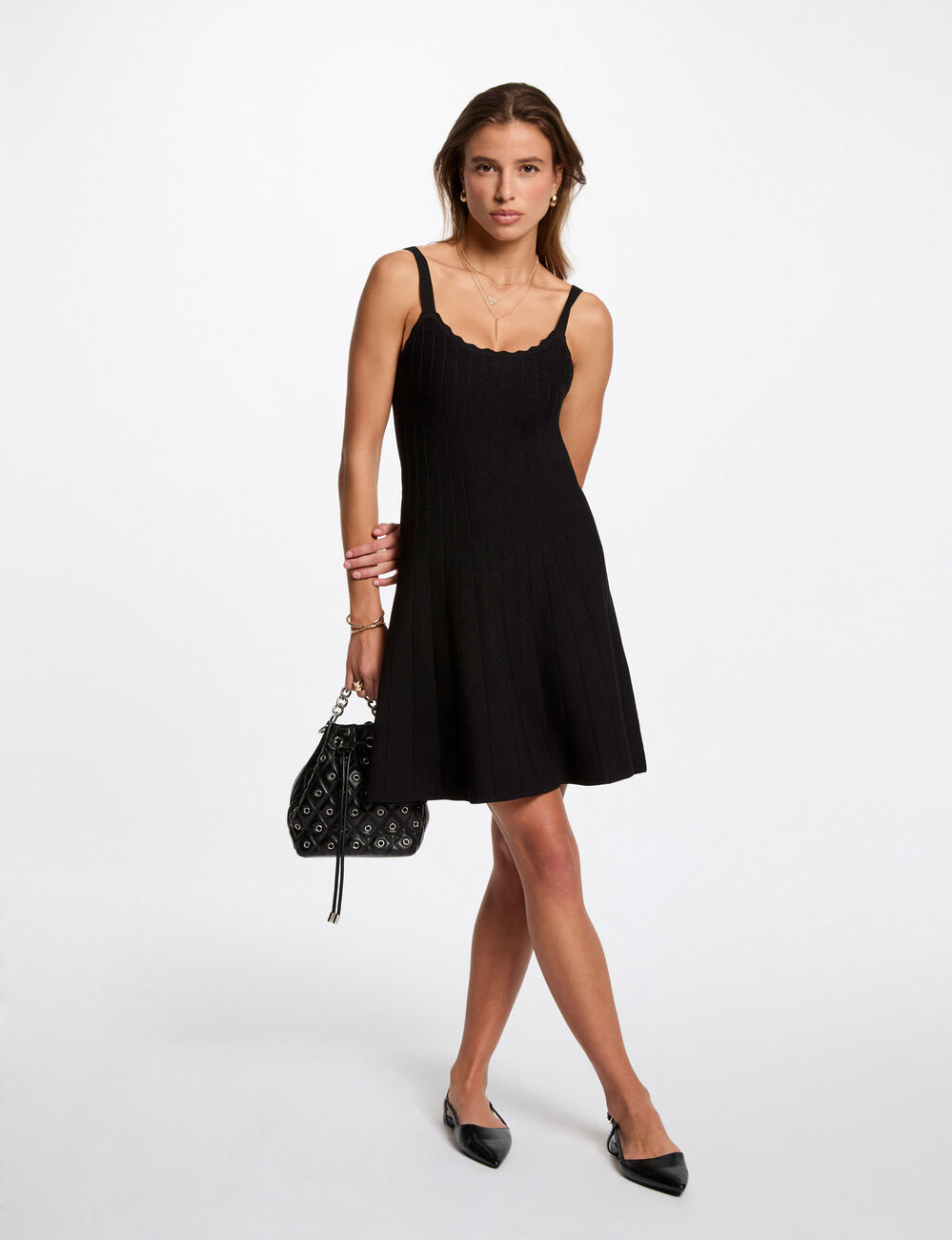 Vestido punto corto evasé negro mujer