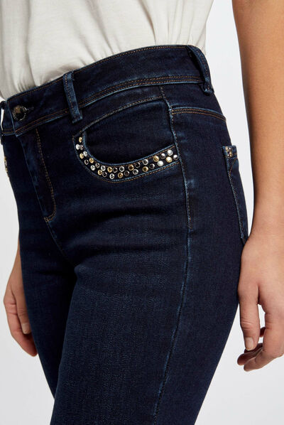 Vaquero slim bolsillos con tachuelas vaquero en bruto mujer