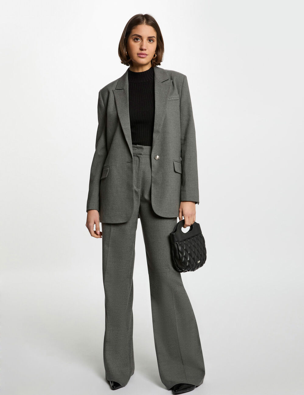 Chaqueta larga con tachuelas gris claro mujer
