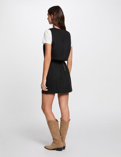 Falda corta tweed y tachuelas negro mujer