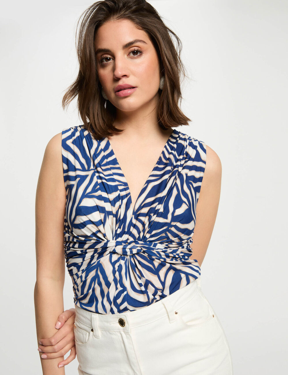 Top sin manga blanco mujer