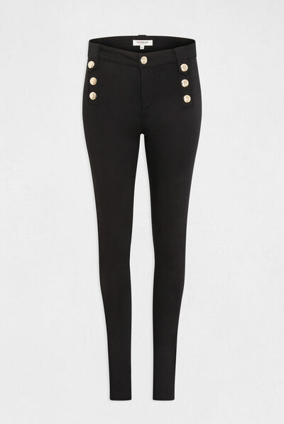 Pantalón skinny con botones decorativos negro mujer