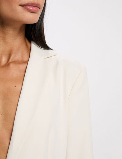 Chaqueta sin mangas creme mujer
