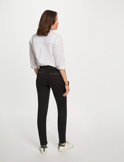 Pantalón slim efecto mojado negro mujer