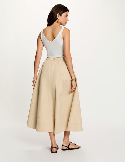 Top brillante con cuello en V blanco mujer