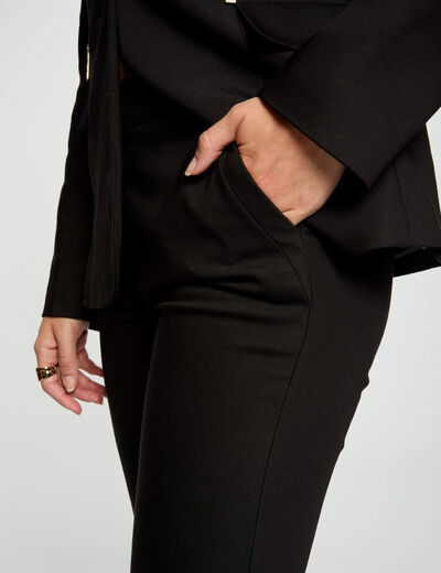 Pantalón ajustado negro mujer