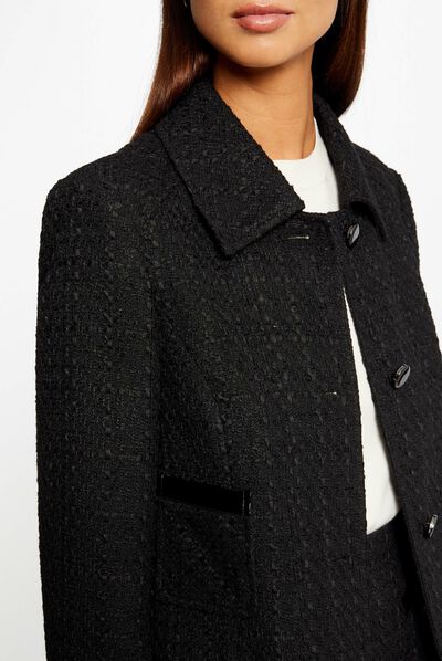 Chaqueta larga recta detalles de vinilo negro mujer