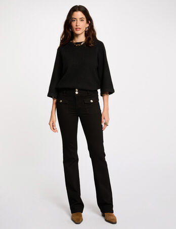 Vaquero boot-cut con bolsillos de solapa negro mujer