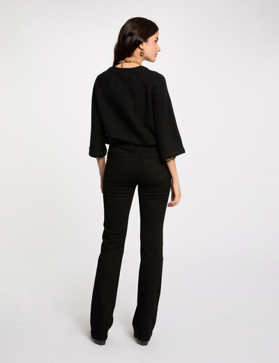 Vaquero boot-cut con bolsillos de solapa negro mujer