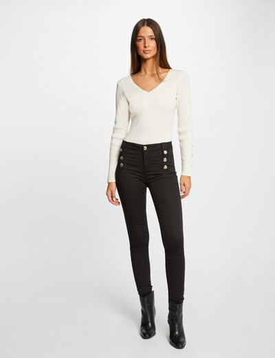 Pantalón skinny con botones decorativos negro mujer
