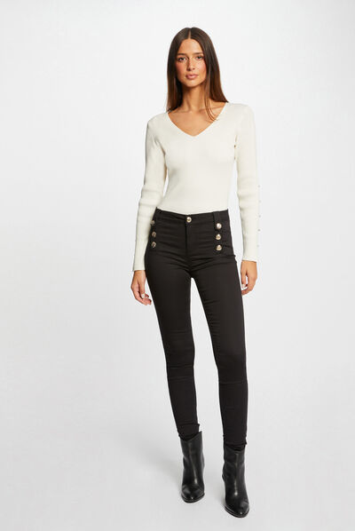 Pantalón skinny con botones decorativos negro mujer