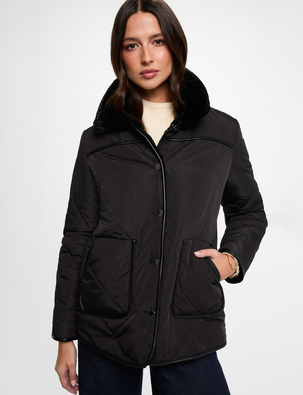 Plum&iacute;fero reversible negro mujer