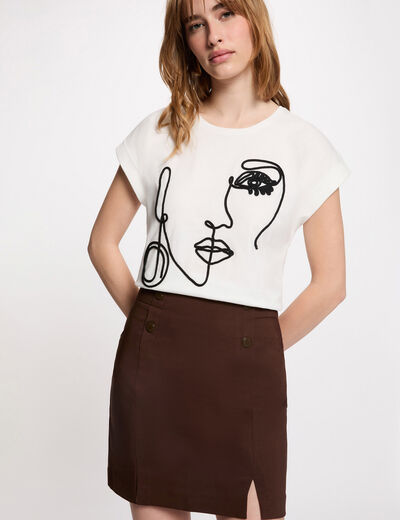Camiseta bordado rostro blanco mujer