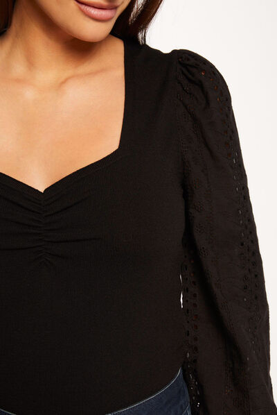 Jersey manga larga abullonada de bordado negro mujer