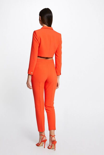Pantalón city ajustado con botones naranja mujer