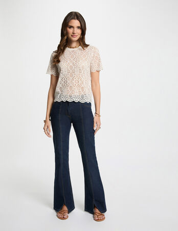 Vaquero boot-cut denim crudo mujer