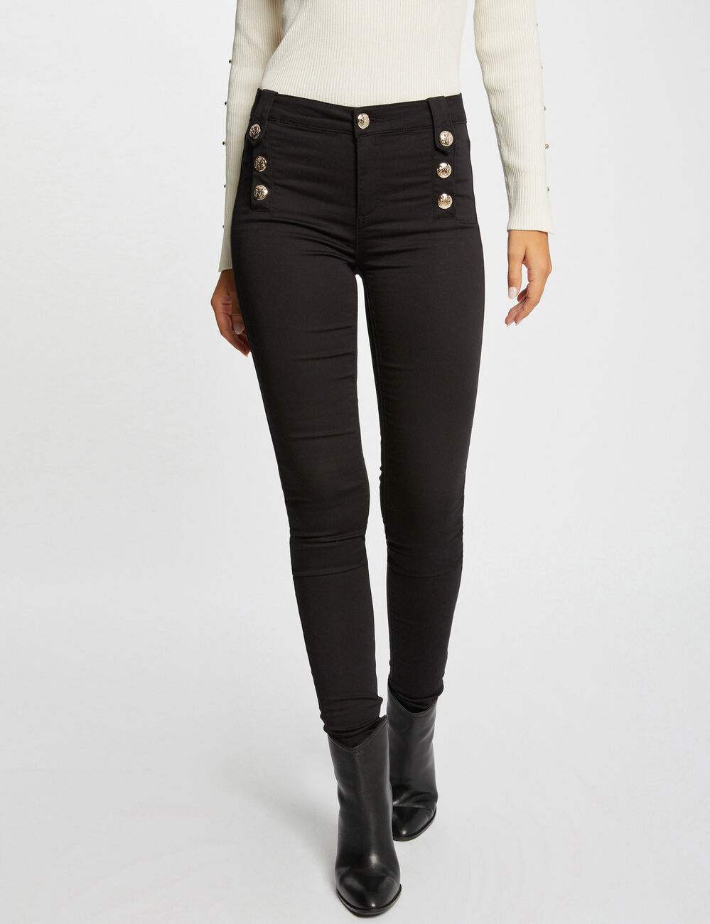 Pantalón skinny con botones decorativos negro mujer