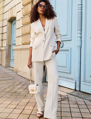 Pantalón pernera ancha rayas beige mujer