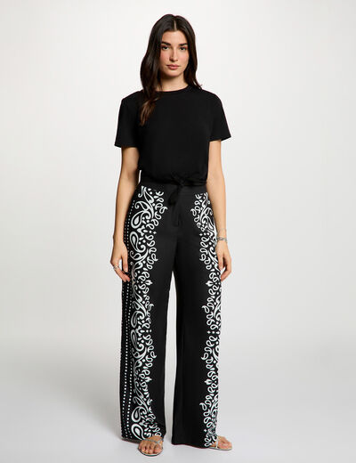 Pantal&oacute;n fluido estampado negro mujer