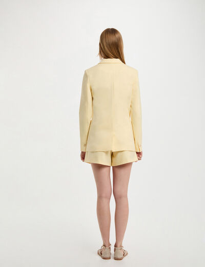 Americana bolsillos traseros amarillo pastel mujer