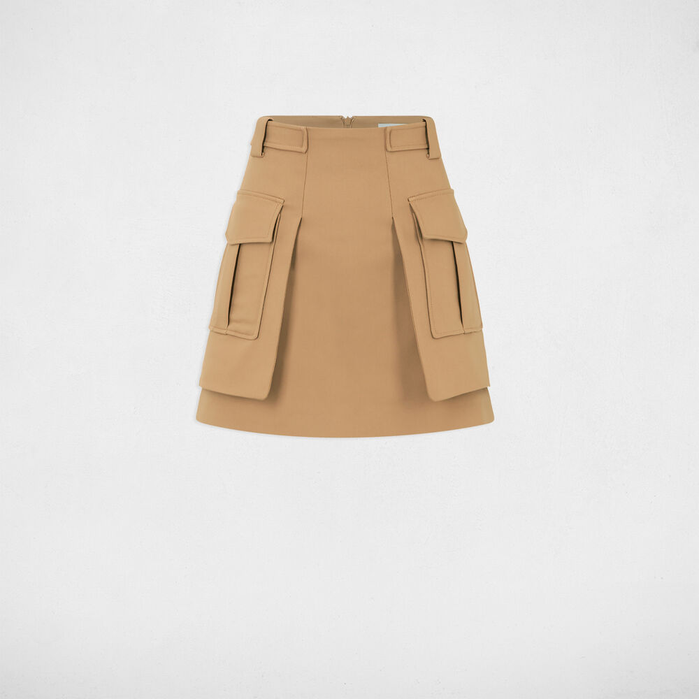 Falda corta bolsillos en lados beige mujer