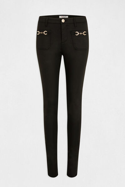 Pantalón skinny con adornos de metal negro mujer