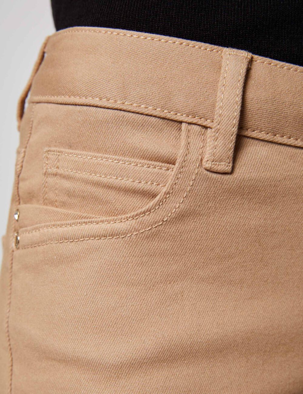 Vaquero skinny talle bajo arena mujer