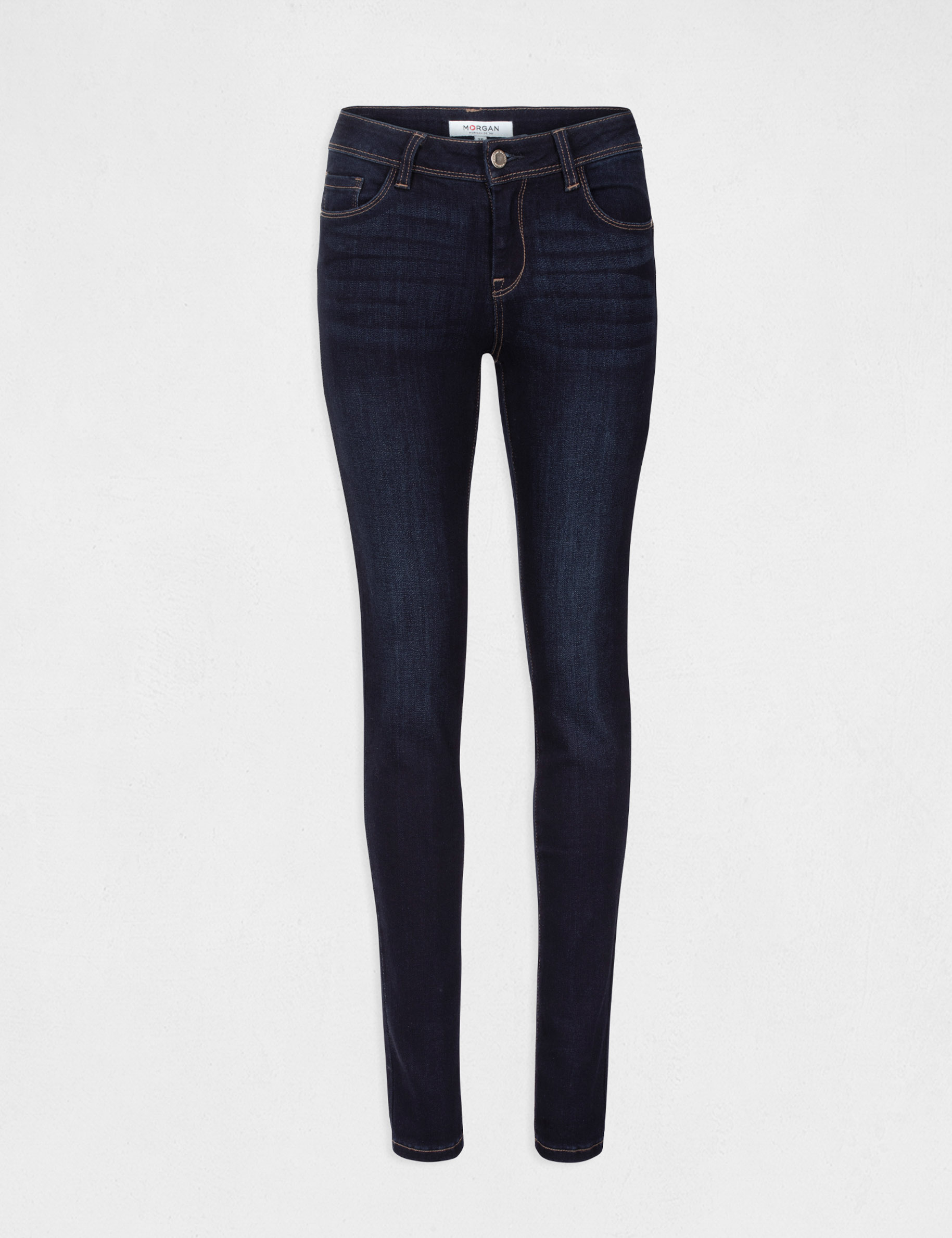 Vaquero slim talle est&aacute;ndar denim crudo mujer
