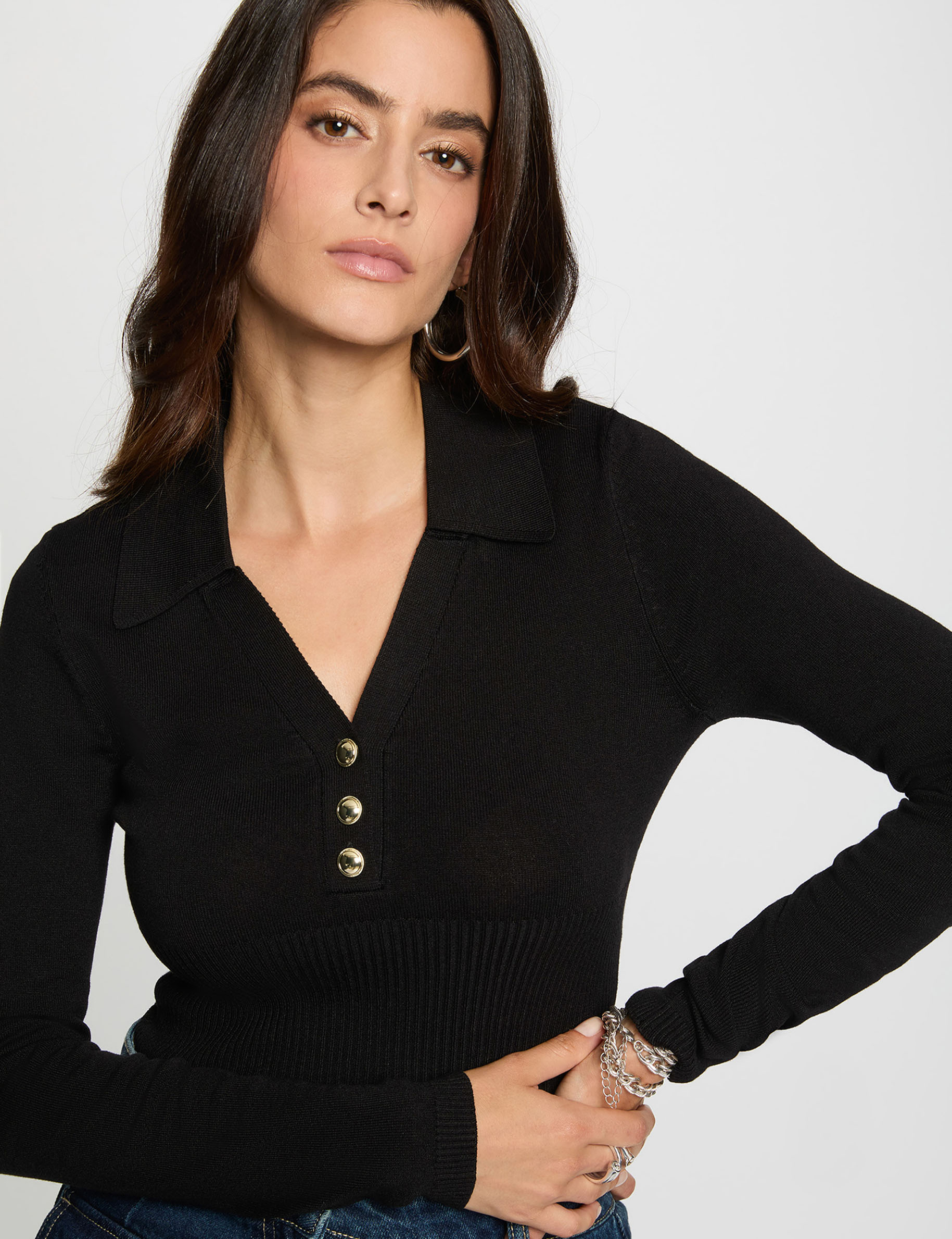 Jersey entallado con cuello polo negro mujer