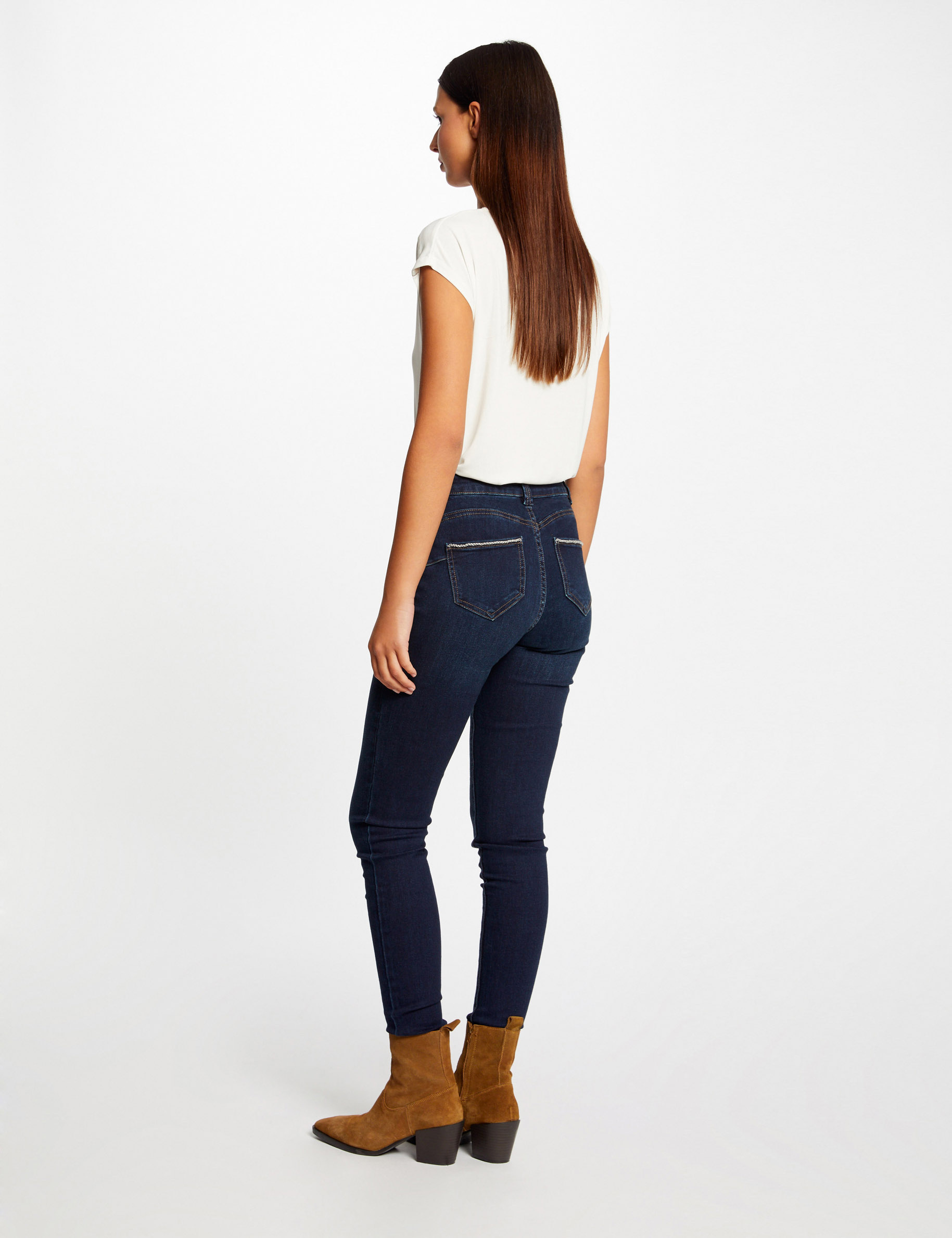 vaquero slim con detalles de cadena vaquero en bruto mujer Vaquero slim con detalles de cadena vaquero en bruto mujer