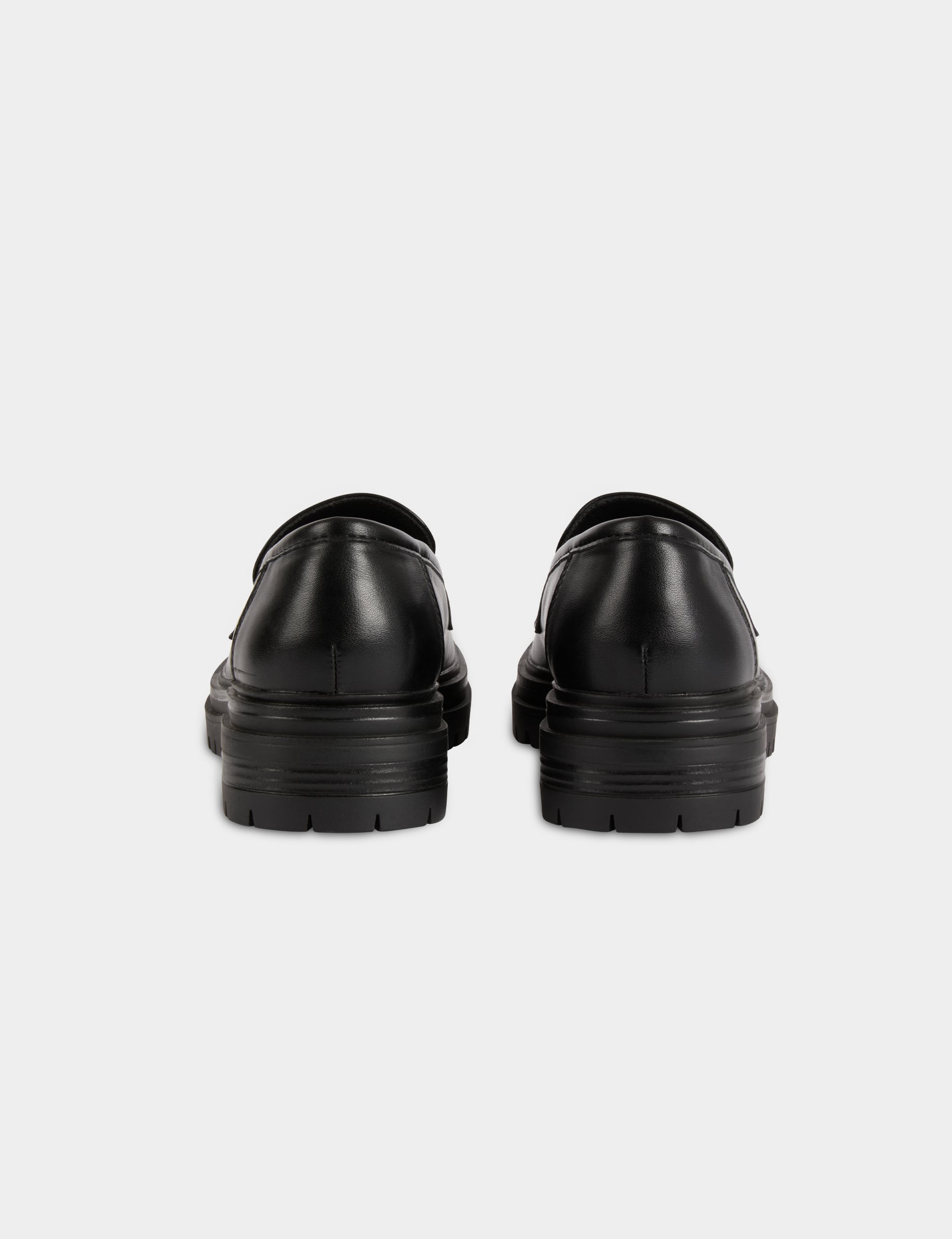 Mocasines con suela dentada negro mujer