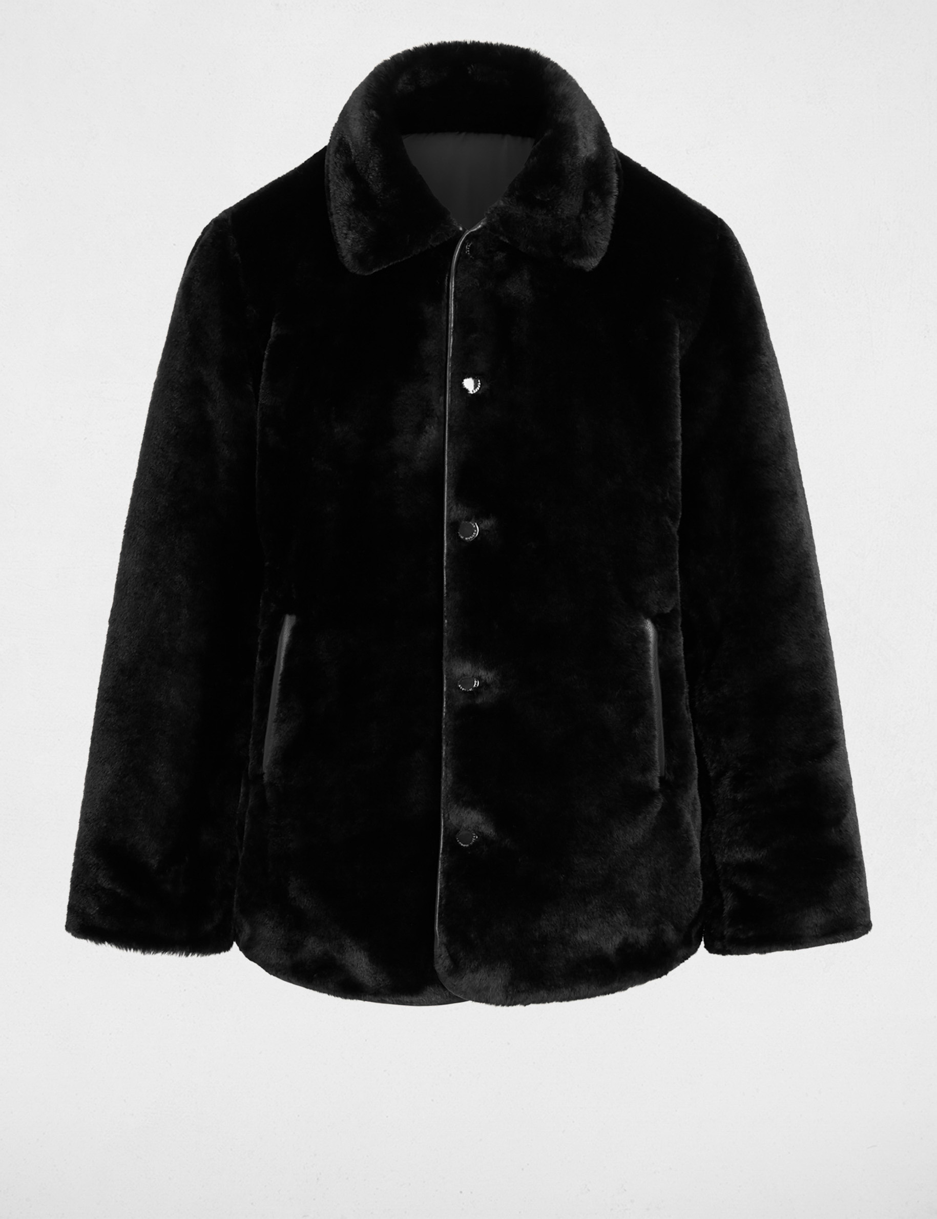 Plum&iacute;fero reversible negro mujer