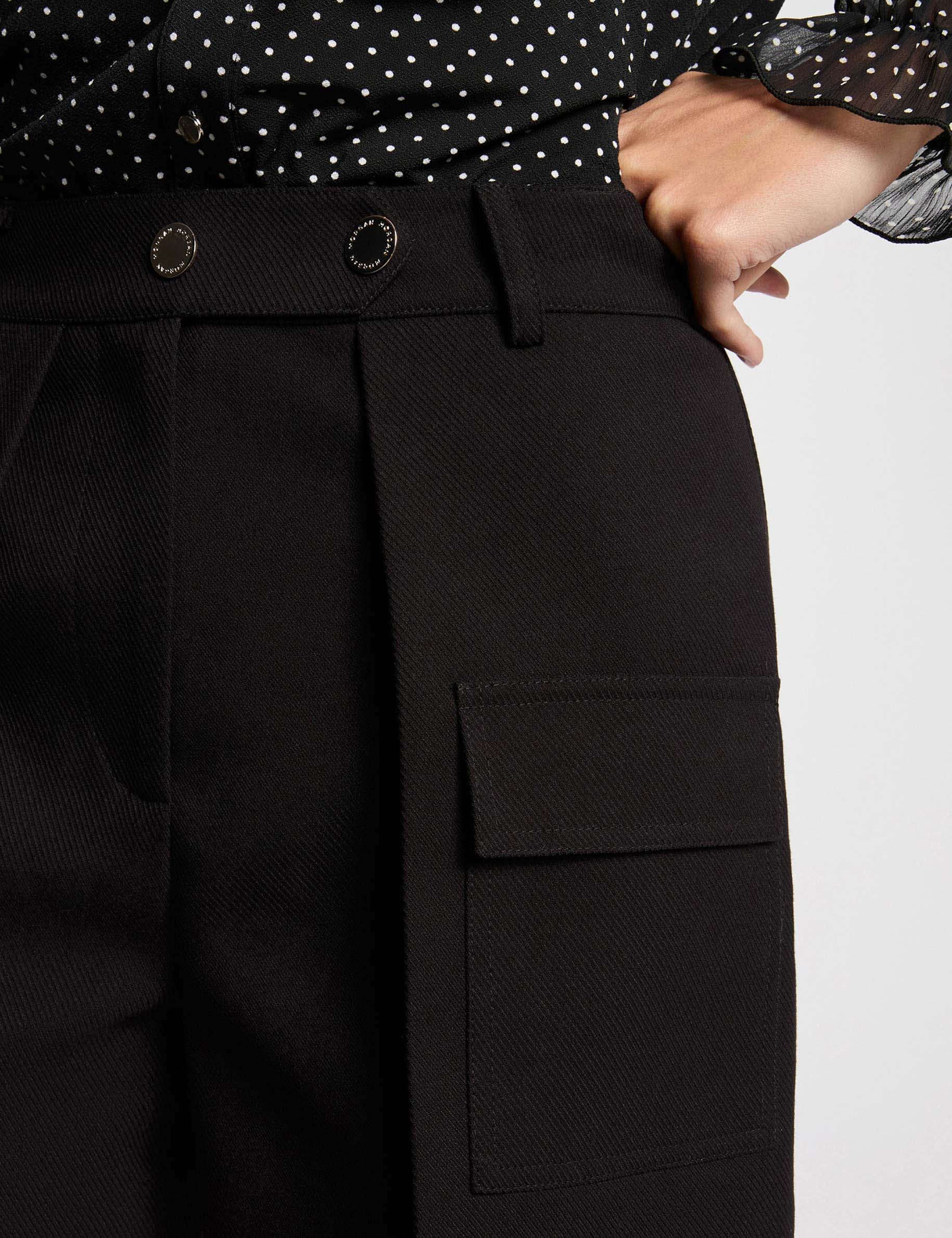 Short recto bolsillos solapa negro mujer