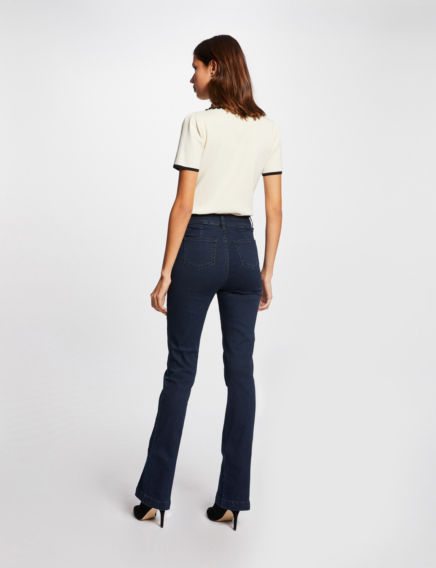 Vaquero boot-cut con detalles trenzados vaquero en bruto mujer